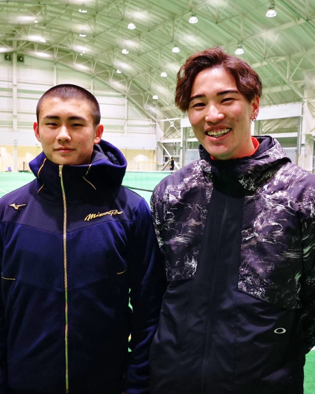 コーチと選手の写真